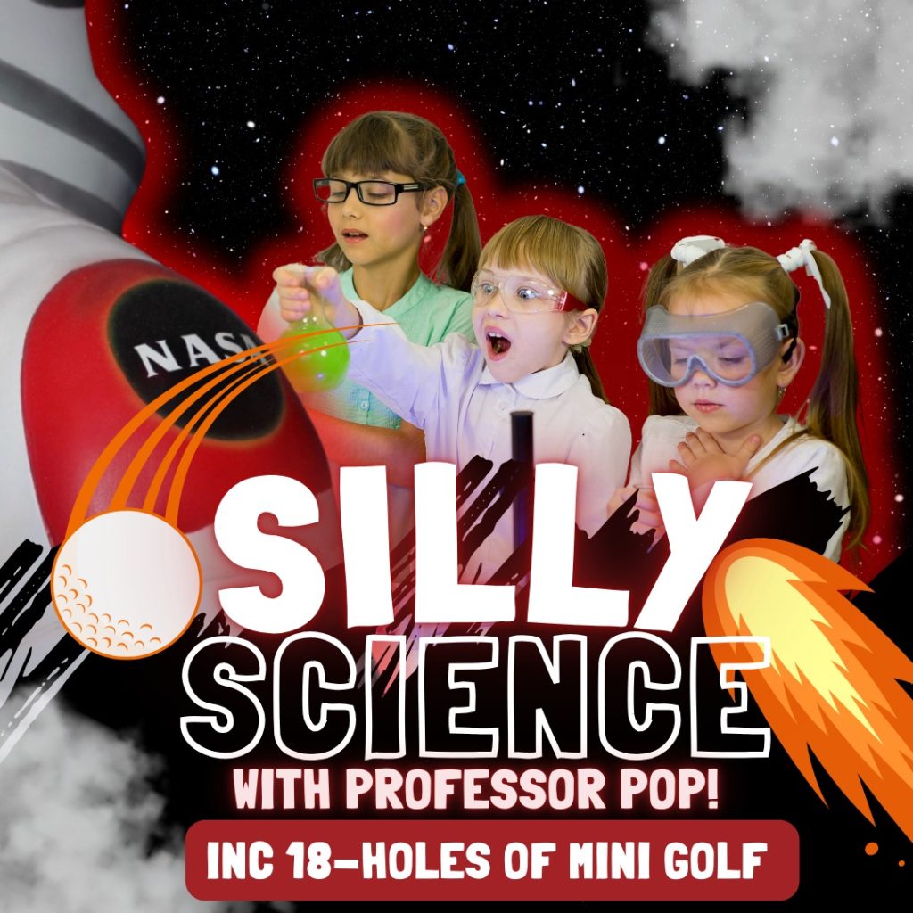 Image of space man statue with three children standing open mouthed in awe at science experiments